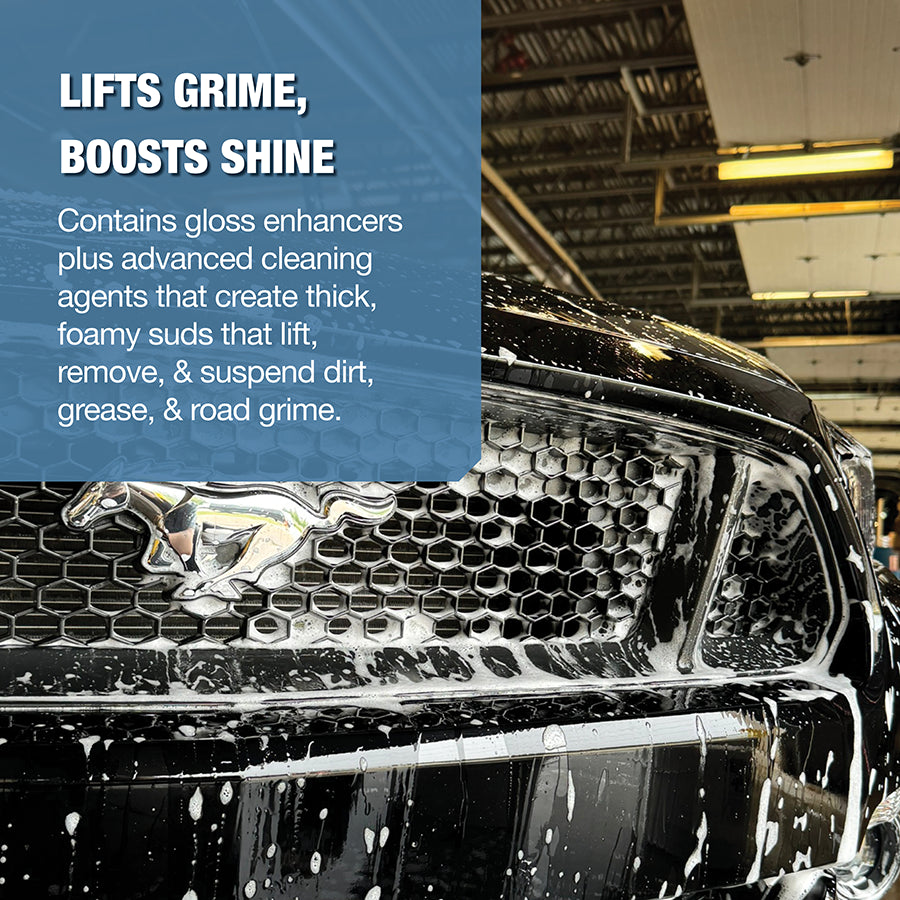Car grill with soap and water and overlay text: Lifts grime, boosts shine. Contains gloss enhancers plus advanced cleaning agents that create thick, foamy suds that lift, remove, & suspend dirt grease & road grime.